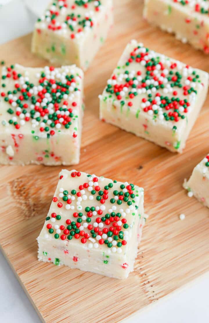 top view of Christmas Cookie Fudge on wooden board.