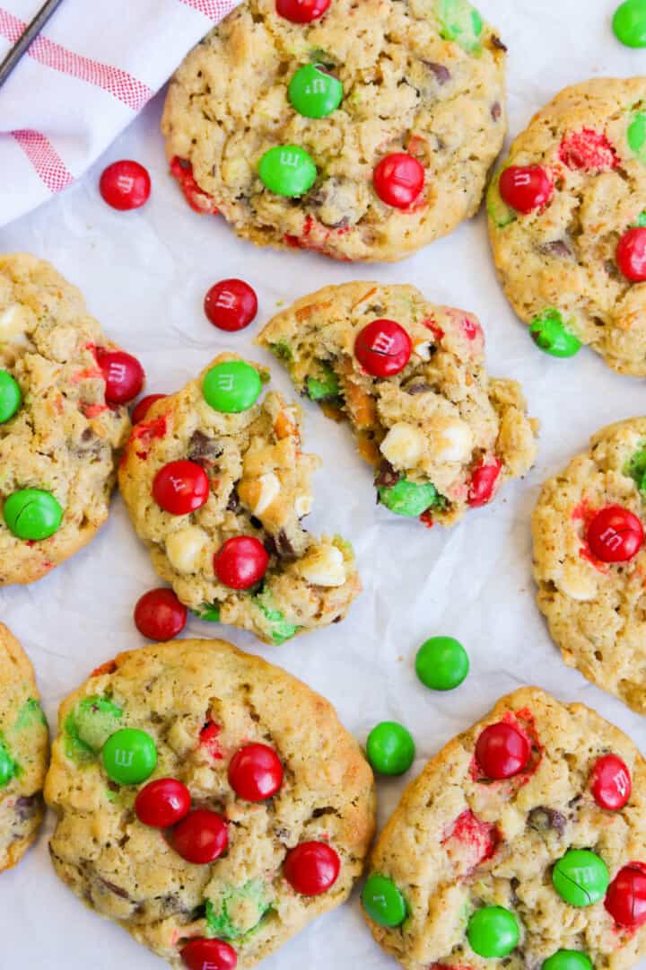 Christmas Monster Cookies on parchment paper.