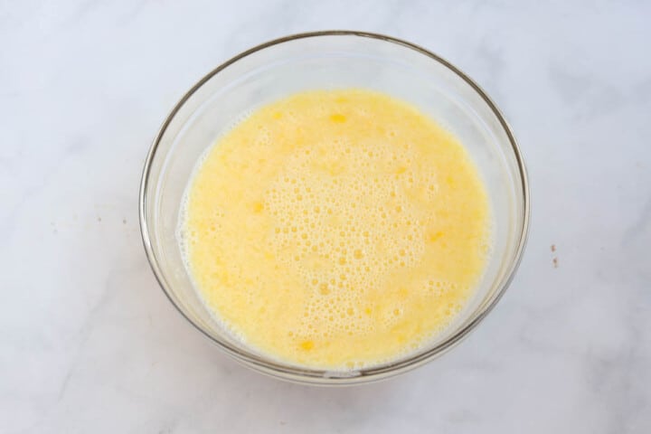 mixing wet ingredients for pancakes.