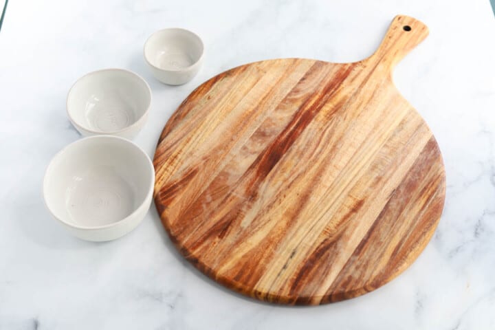 picture of the serving board and cups for the jams.