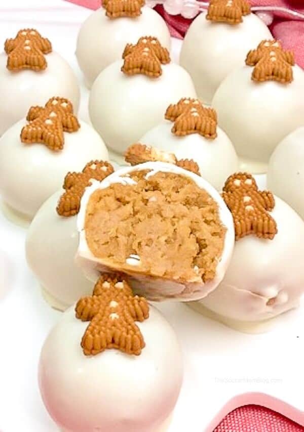 White Chocolate Gingerbread Truffles on white serving board.