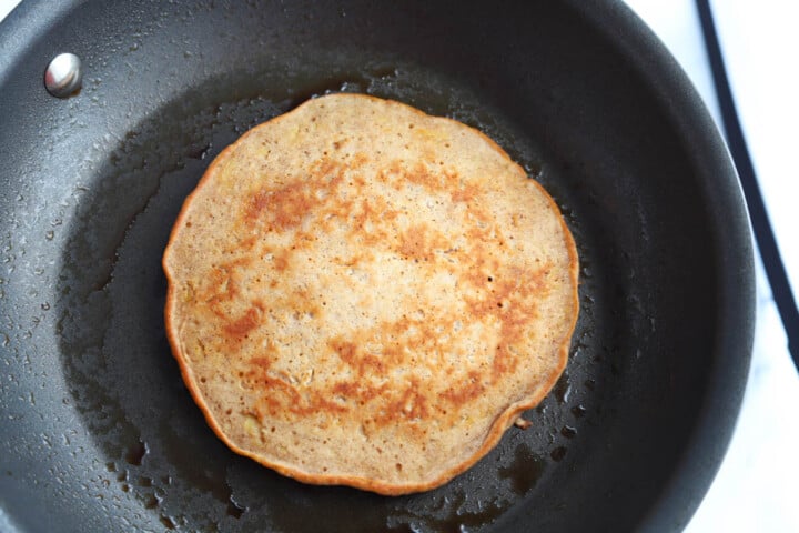 cooking pancake on skillet.