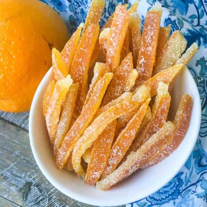 Candied Orange Peels in white serving bowl.