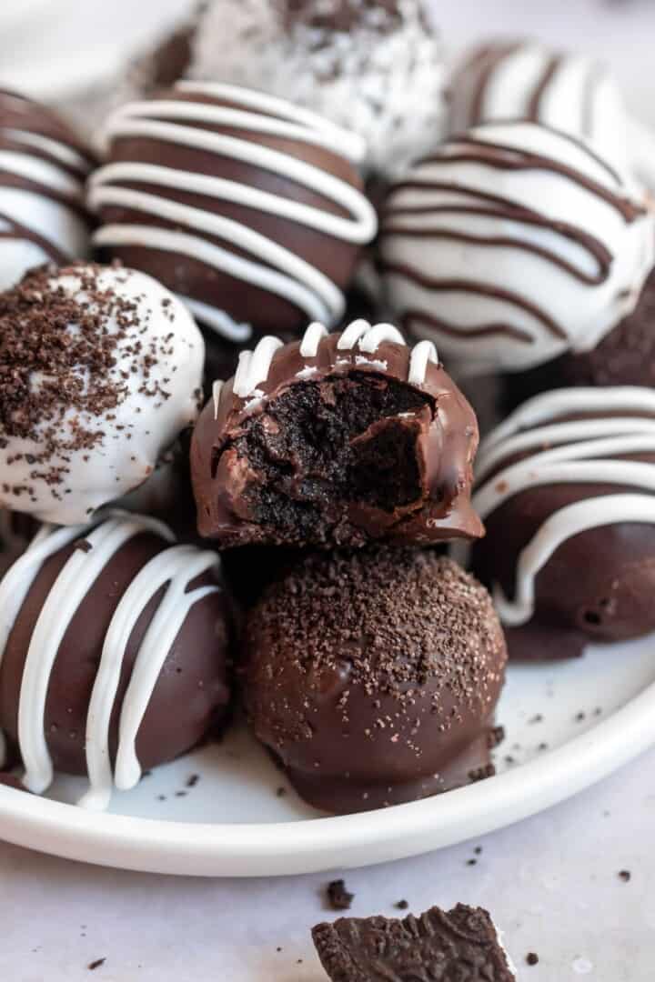 Oreo Balls on white plate for serving.