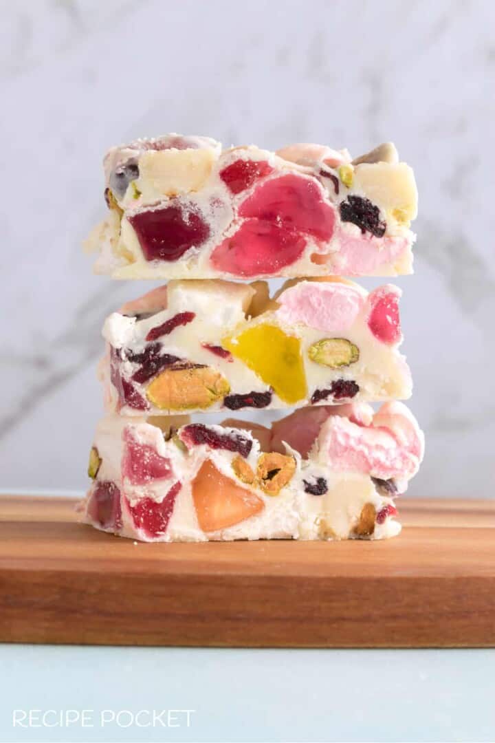  White Chocolate Rocky Road stacked on wooden board.