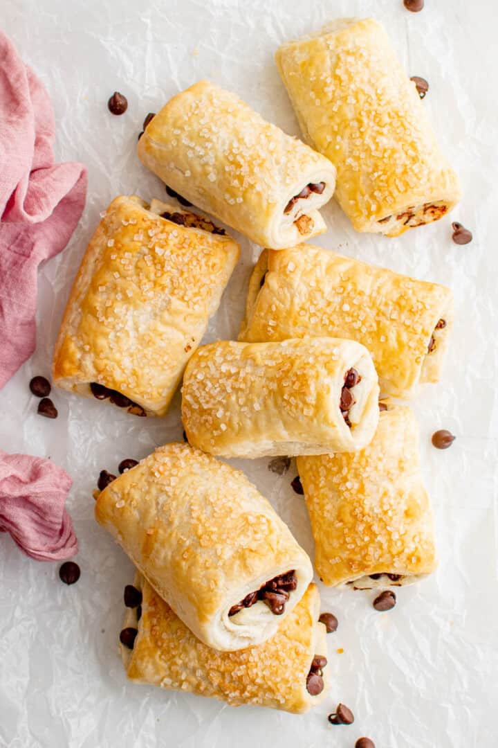 chocolate puff pastries on parchment paper ready for serving.