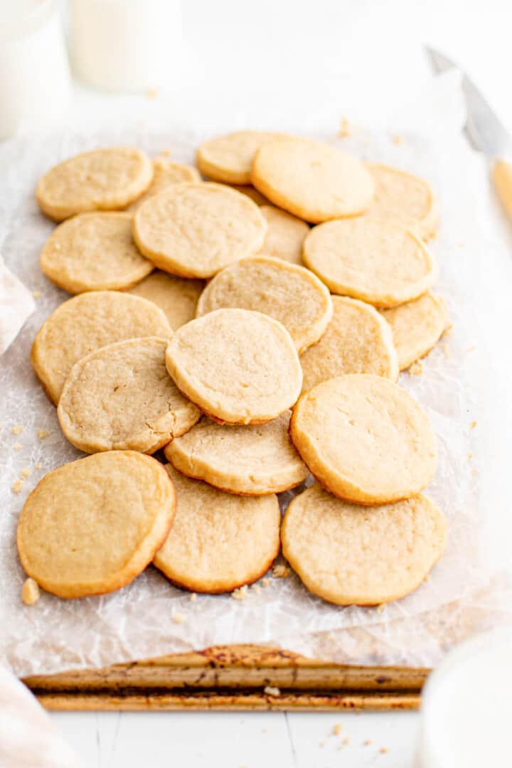 baked slice and bake cookies on baking sheet with parchment paper.