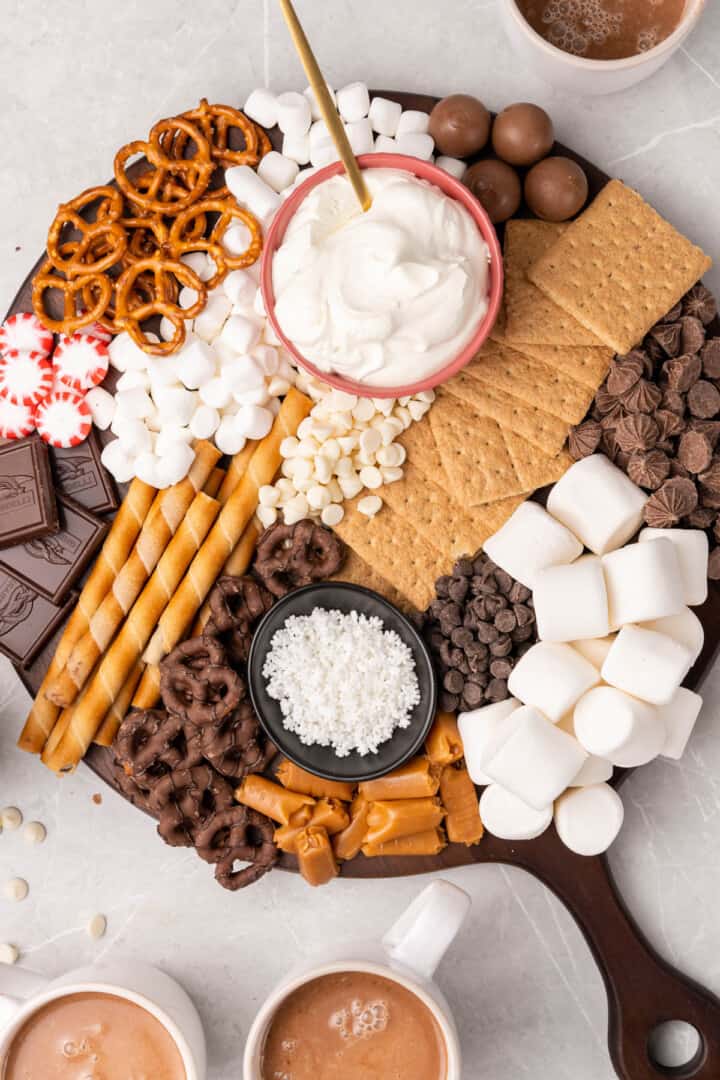 Hot Chocolate charcuterie board with lots of toppings.