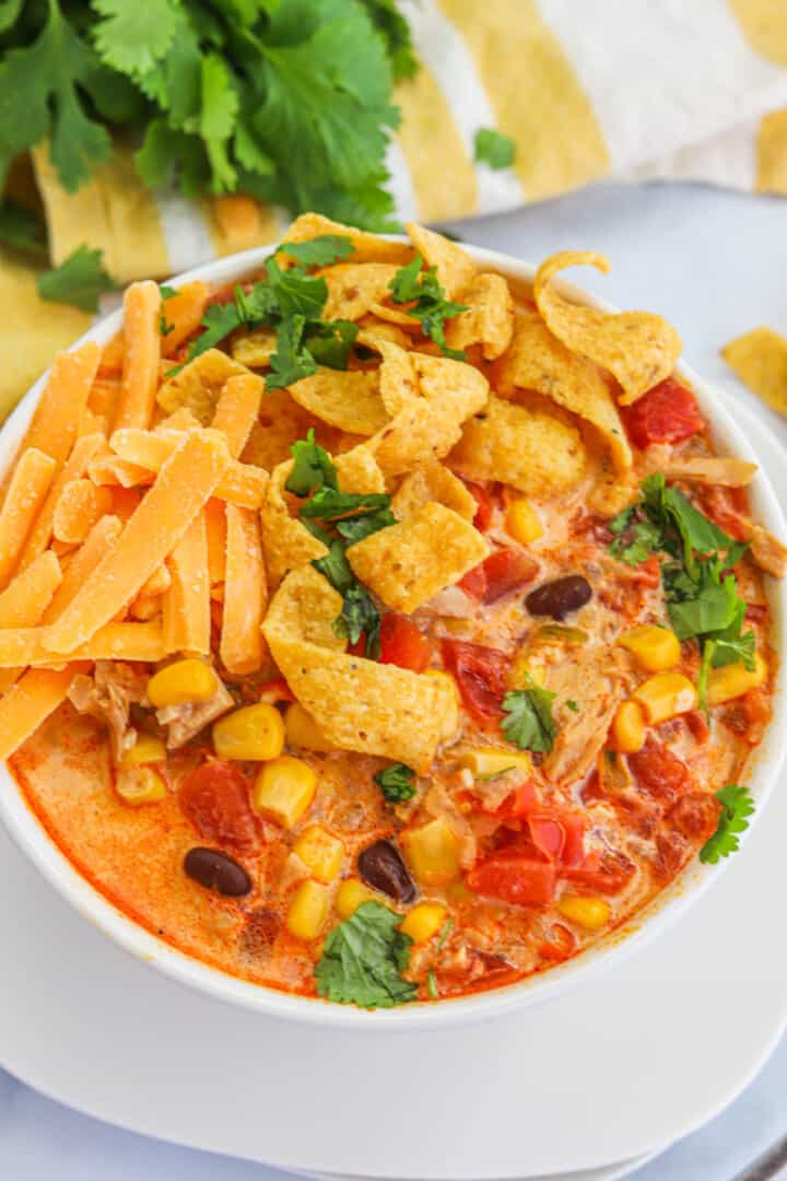 Creamy Chicken Tortilla Soup in white bowl.