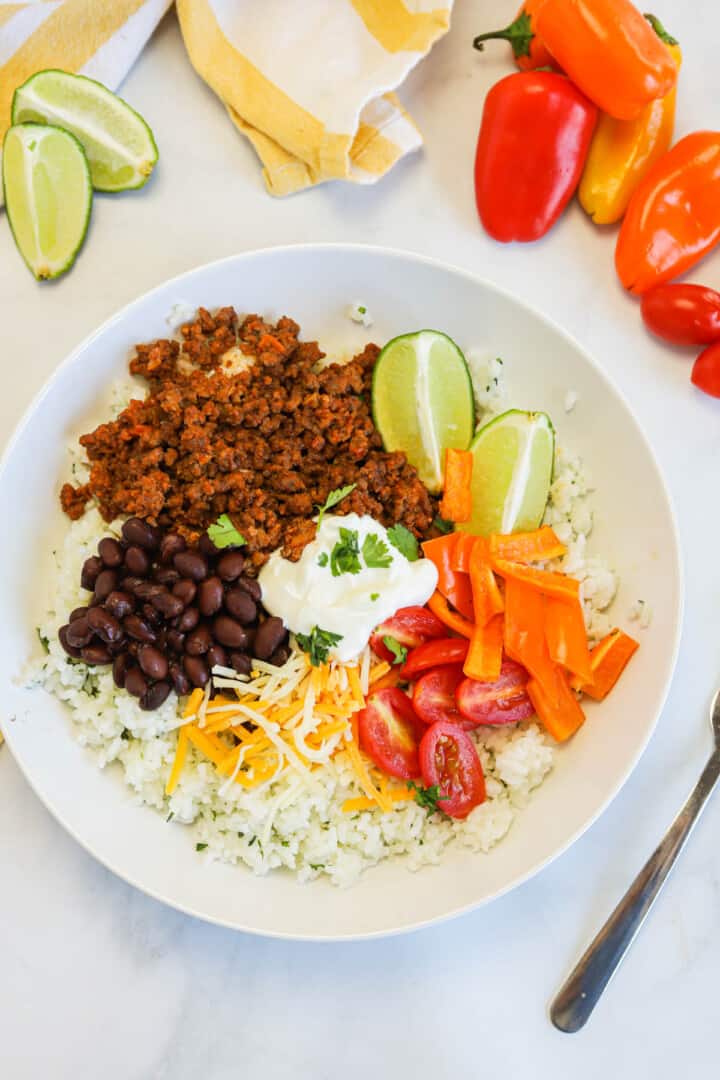 top view of taco bowl in white bowl.