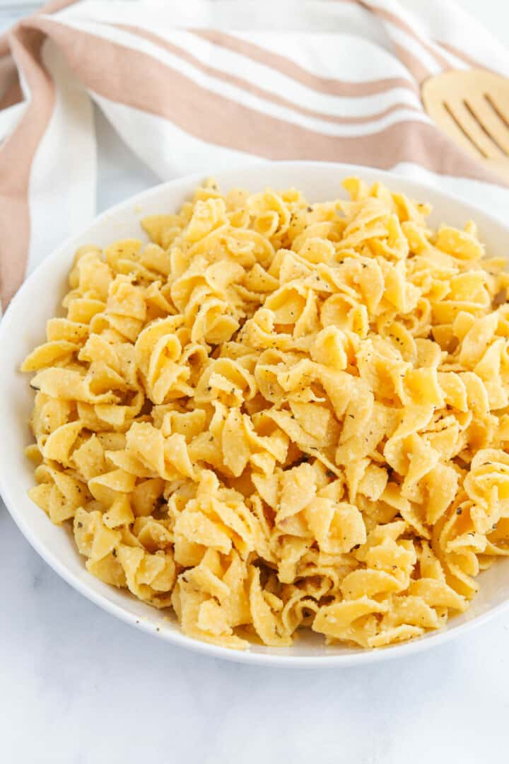 Butter Noodles in a white bowl for serving.