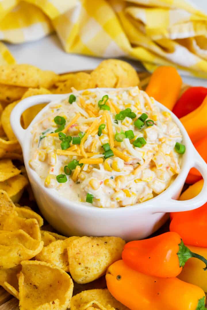 closeup of crack corn dip in white bowl.