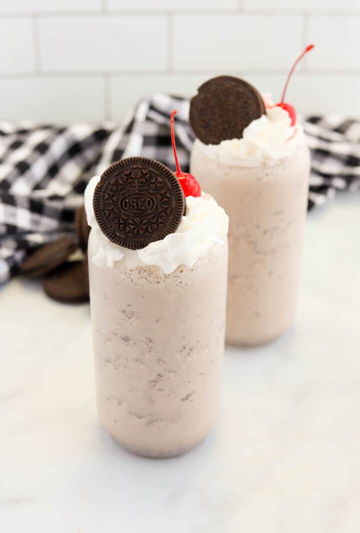 closeup of two Oreo milkshakes.