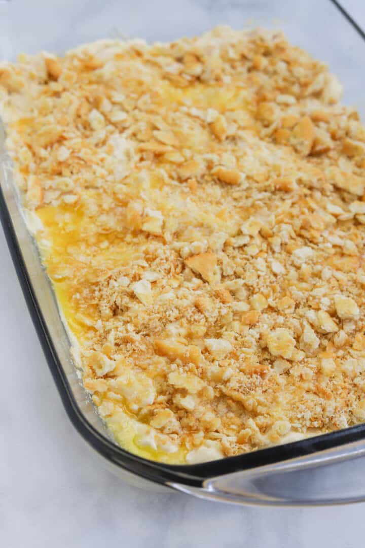 rotisserie chicken casserole in the casserole dish before baking in the oven.