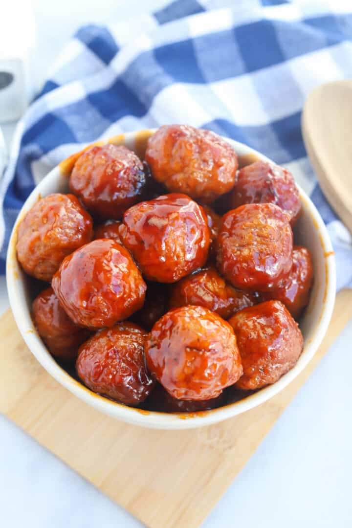 bbq meatballs in white bowl for serving.
