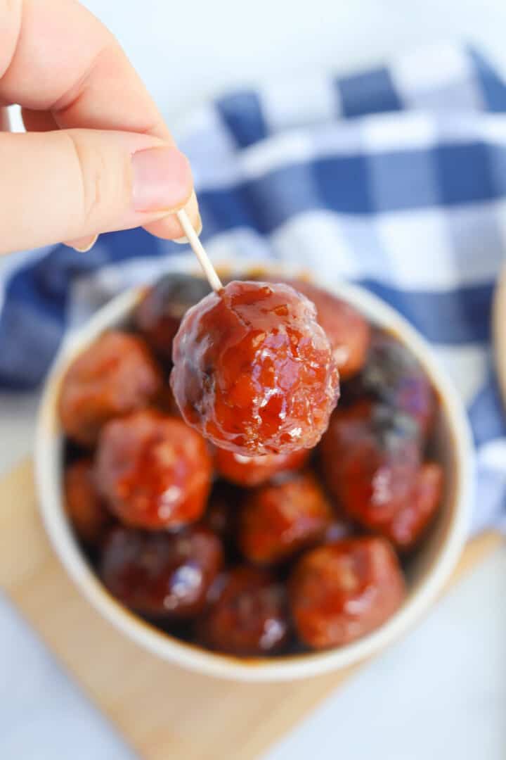 BBQ meatball on a toothpick for eating.