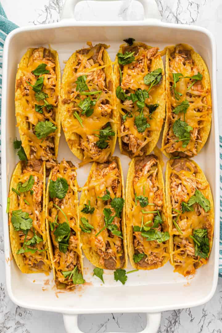 Baked Chicken Tacos in casserole dish.
