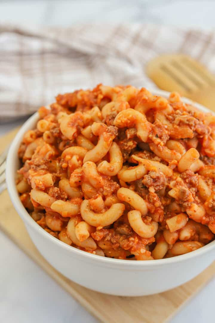 closeup of Beefaroni in white bowl.