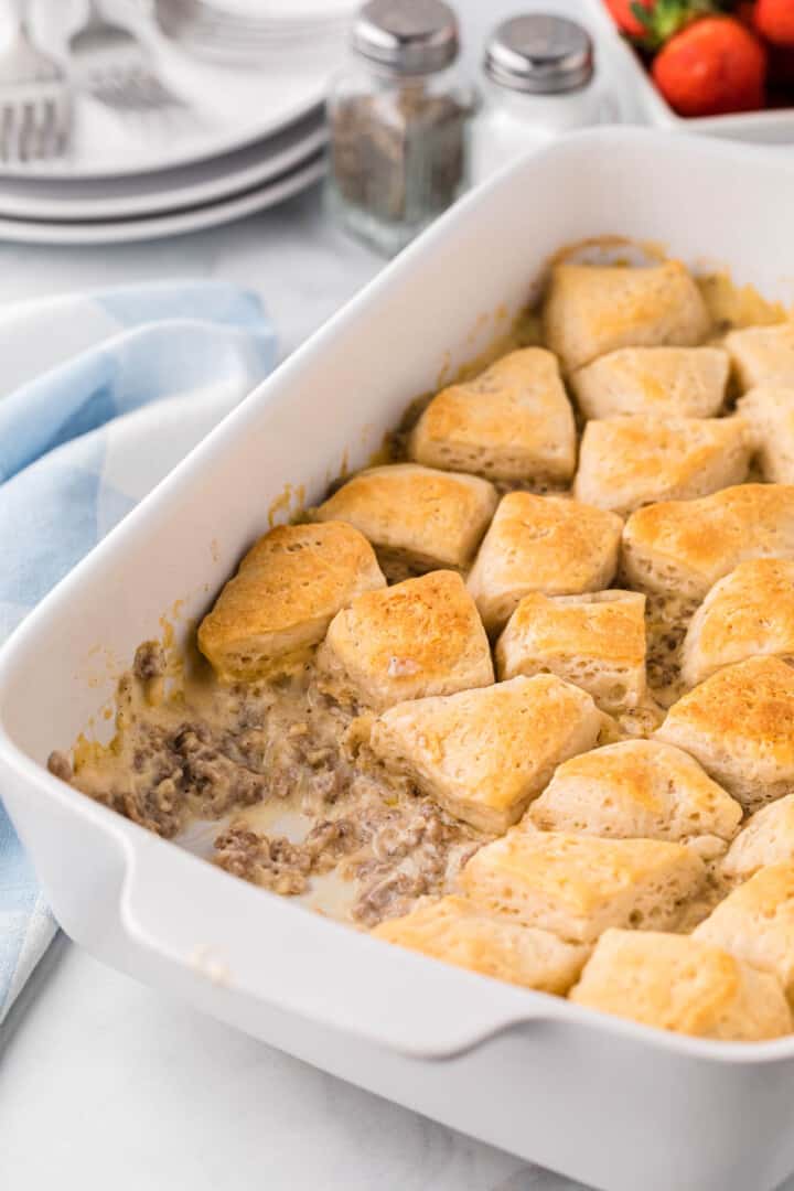closeup of baked biscuits and gravy casserole.