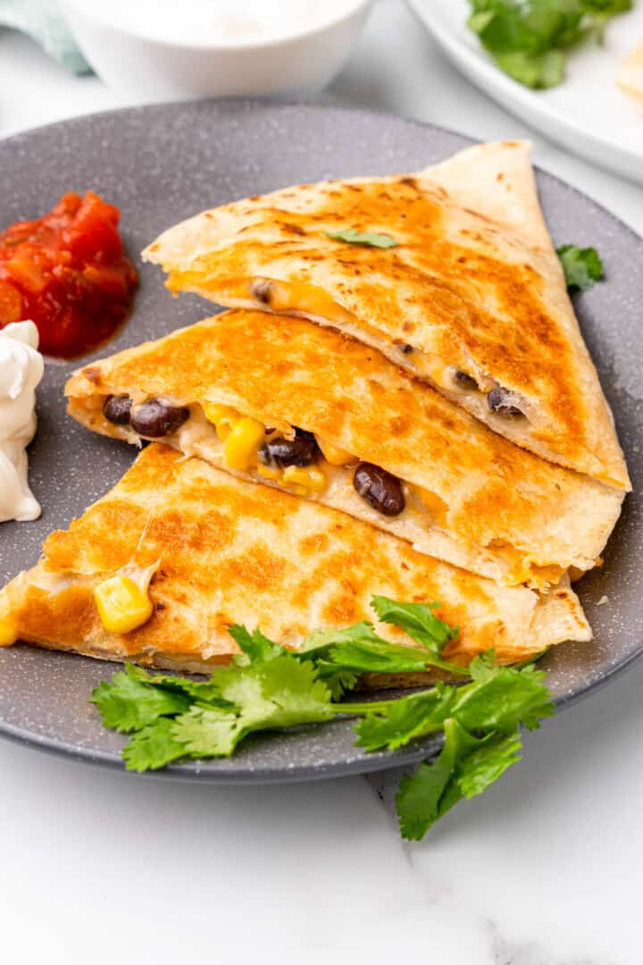 quesadilla sliced on plate.