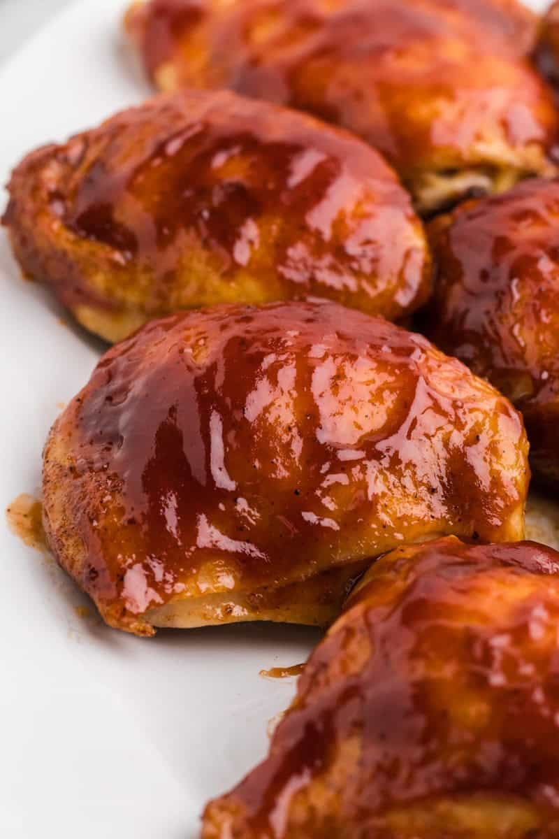 Baked BBQ Chicken Thighs close up in a platter