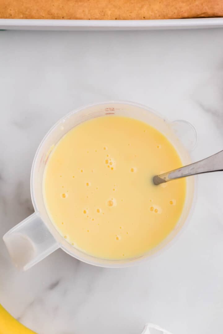 mixing the pudding together for the cake.