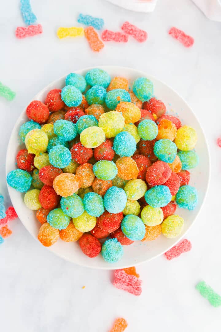 Sour Patch Grapes in white bowl.