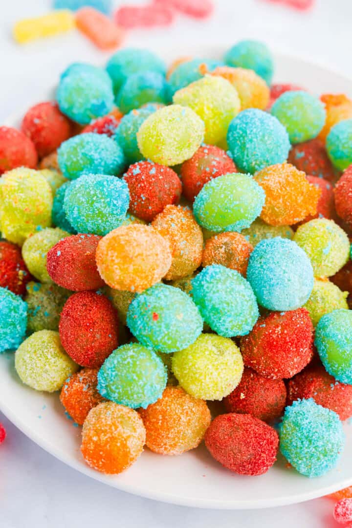 closeup of Sour Patch Grapes in white bowl.