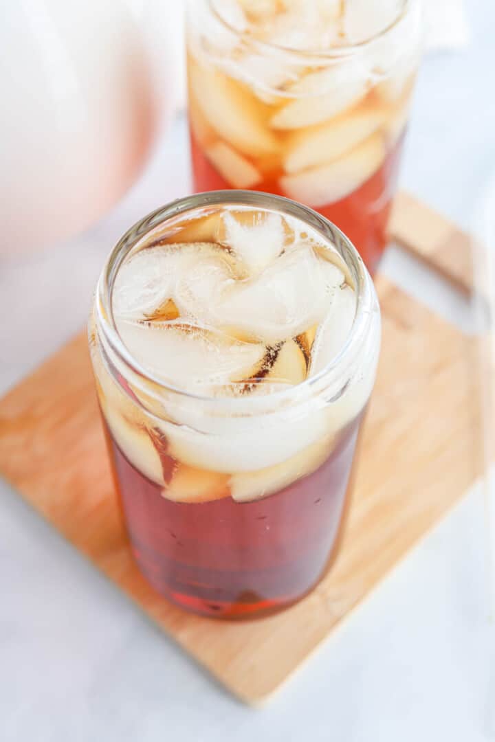 Sweet Tea in glasses on wooden serving board.