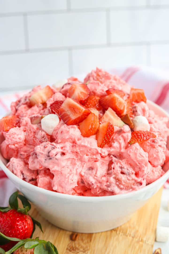 Strawberry Jell-O in white serving bowl.