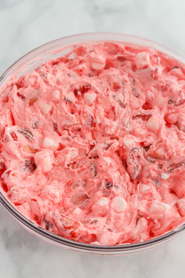 Strawberry Fluff all mixed together in large glass bowl.