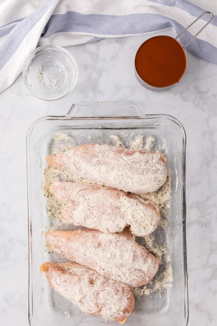 chicken seasoned with the ranch seasoning in baking dish.
