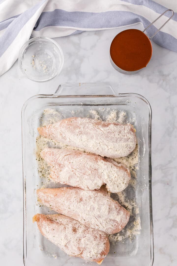 chicken seasoned with the ranch seasoning in baking dish.