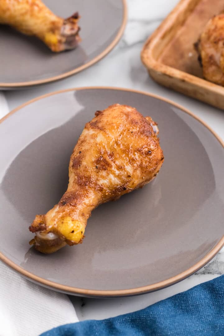 closeup of one drumstick on a plate.
