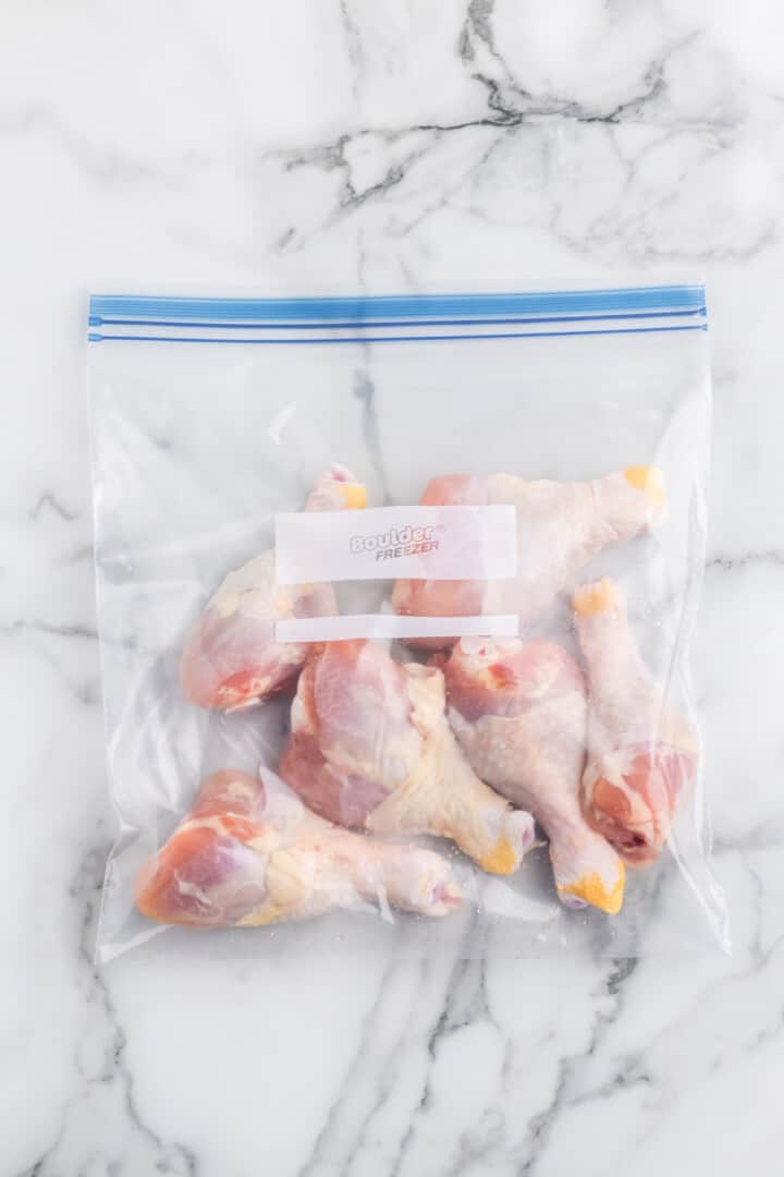chicken drumsticks in large Ziplock bag.