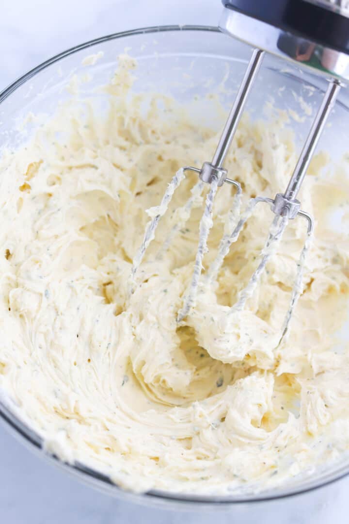 mixing the seasoning and cream cheese together.