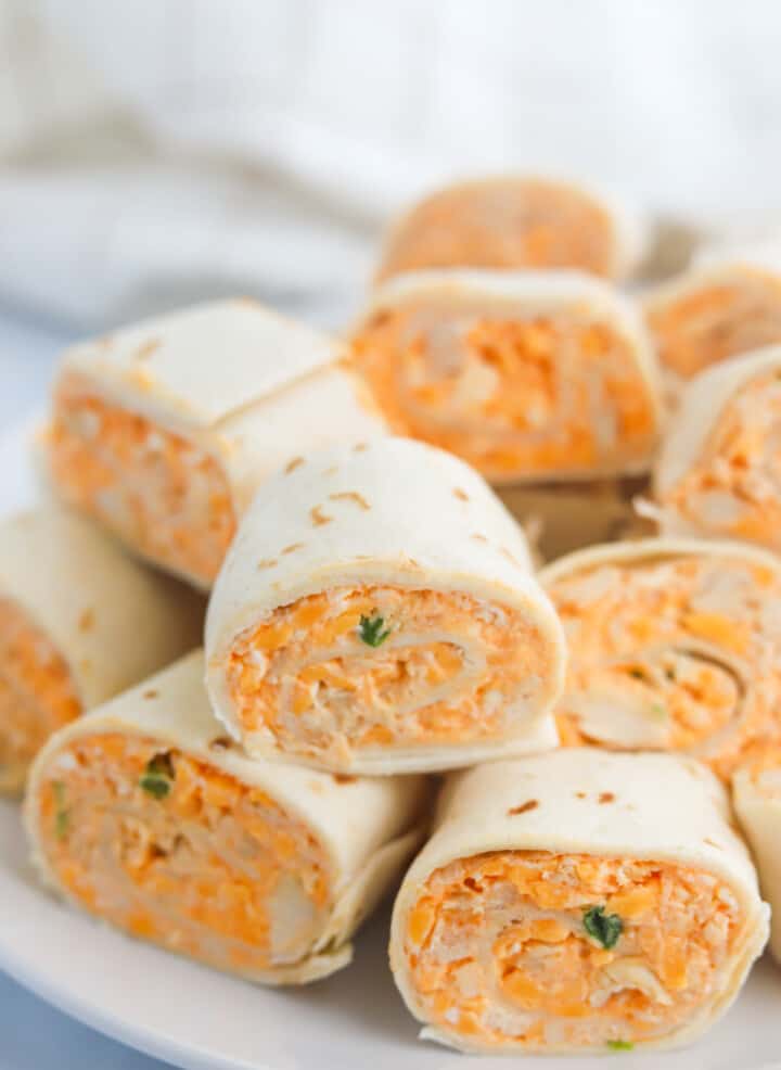 closeup of pinwheels on white plate.