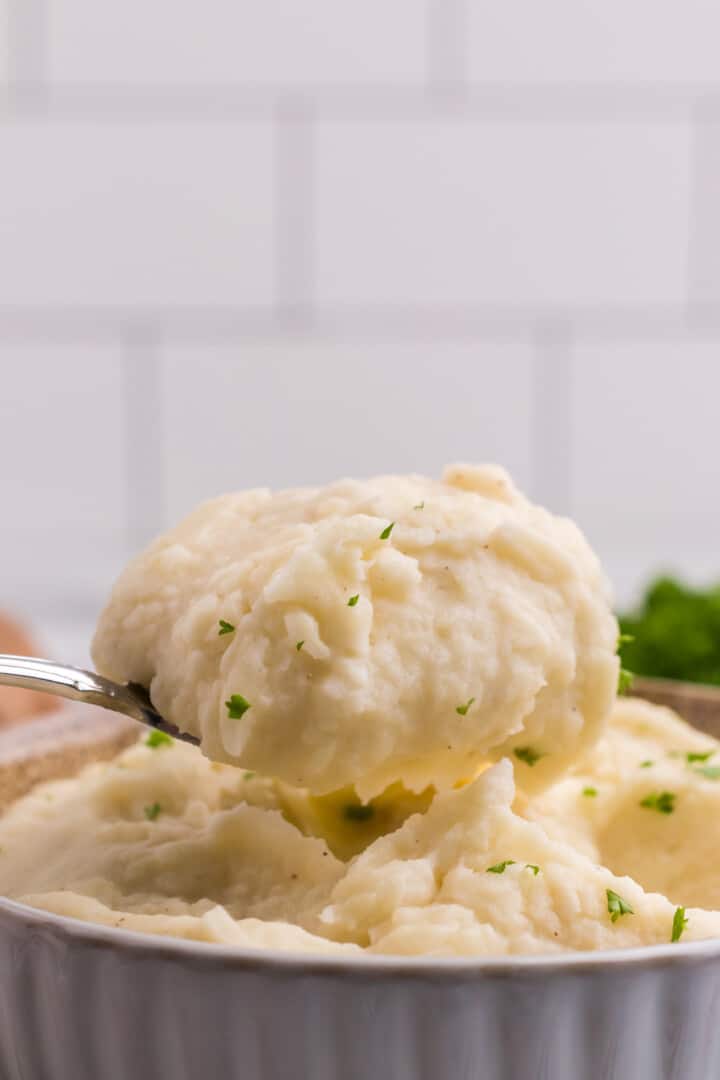 serving the mashed potatoes out of the bowl.