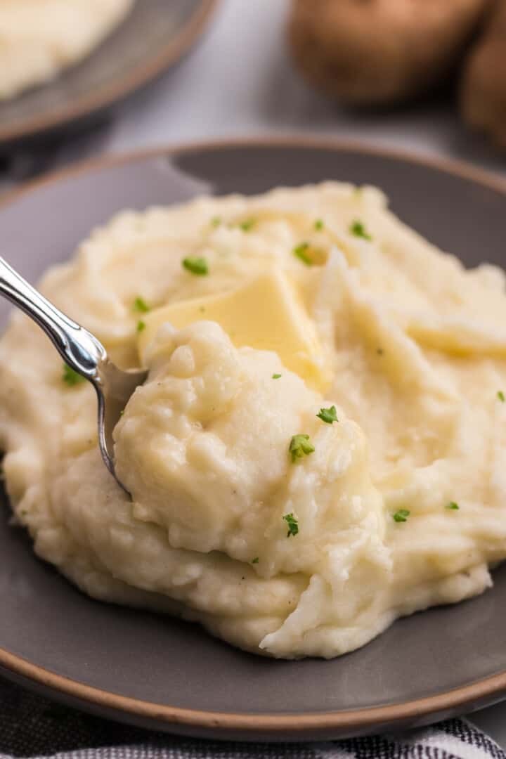 closeup of mashed potatoes on plate.