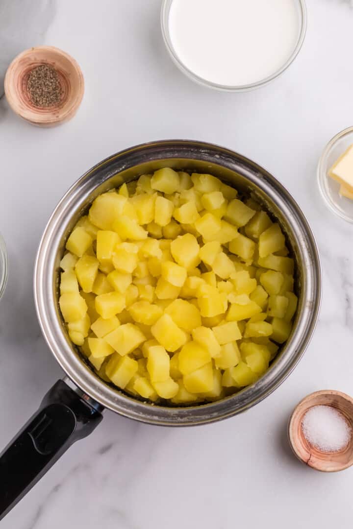 potatoes that have been cooked in a large pot.