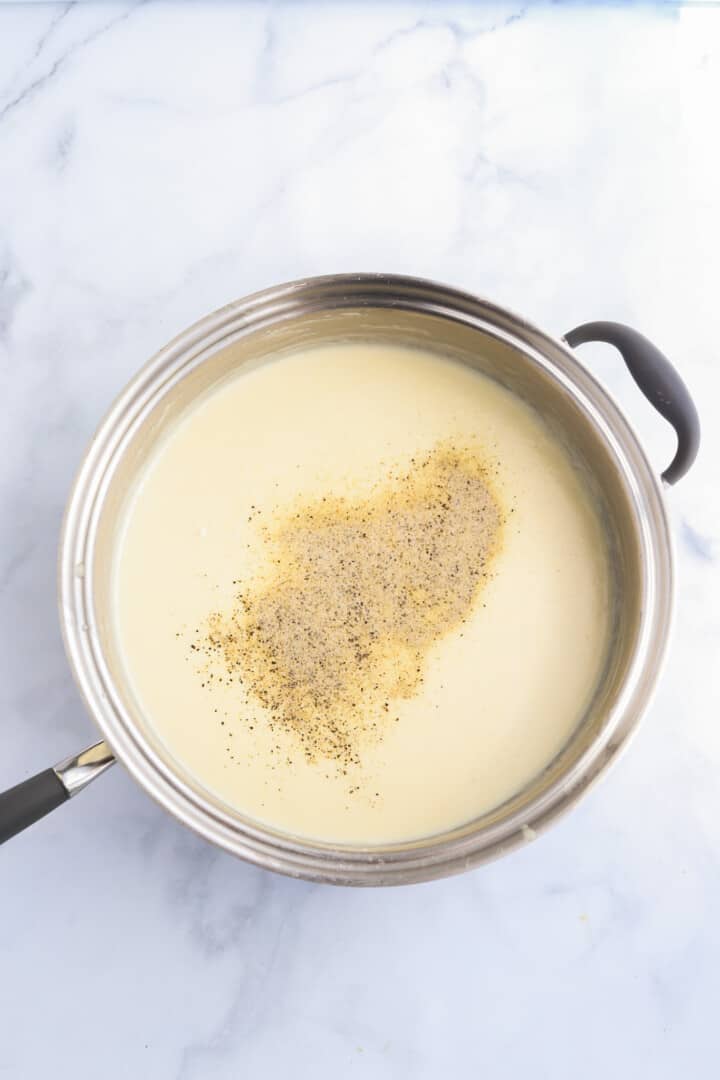 seasoning the cream for the peas.