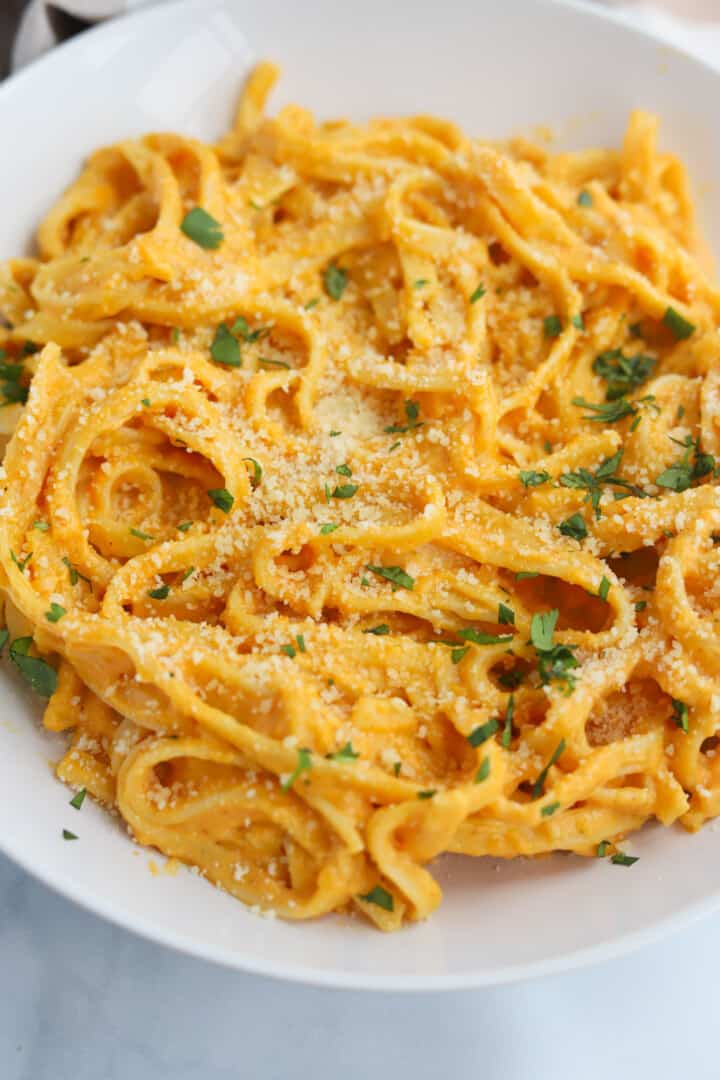 Pumpkin Pasta in white serving bowl.