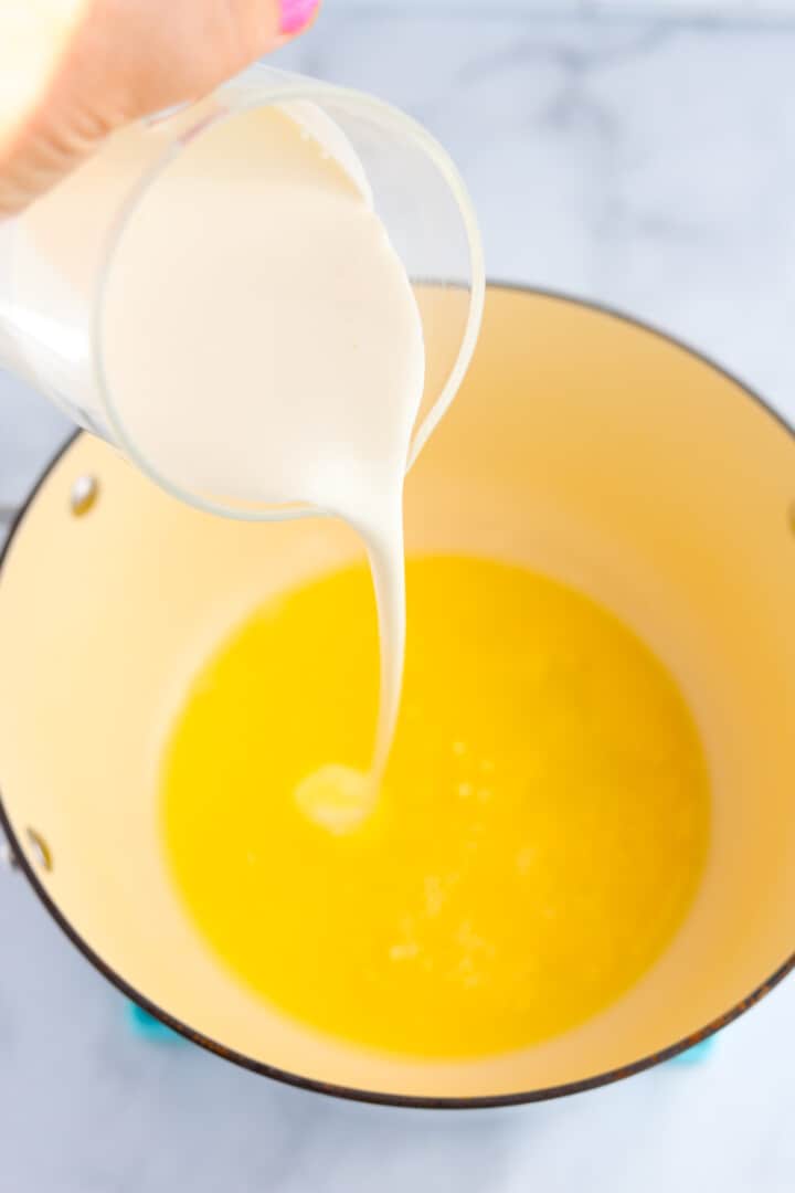 making the sauce for the pumpkin pasta.