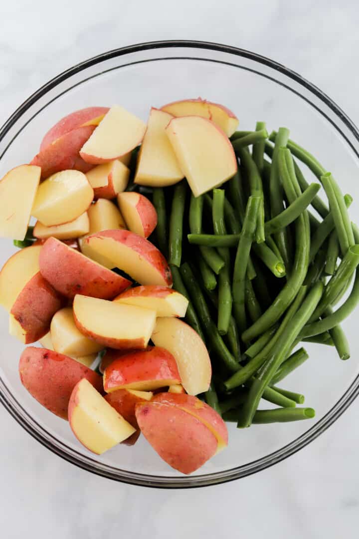 potatoes and green beans in glass bowl