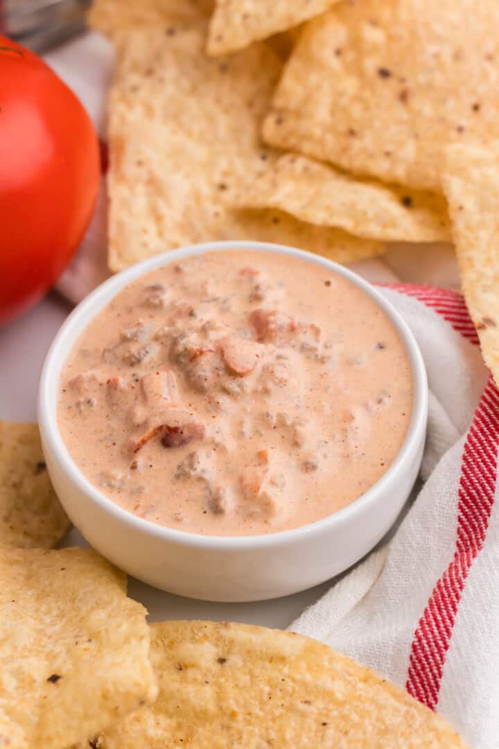 Sausage Cream Cheese Dip with tortilla chips for dipping.