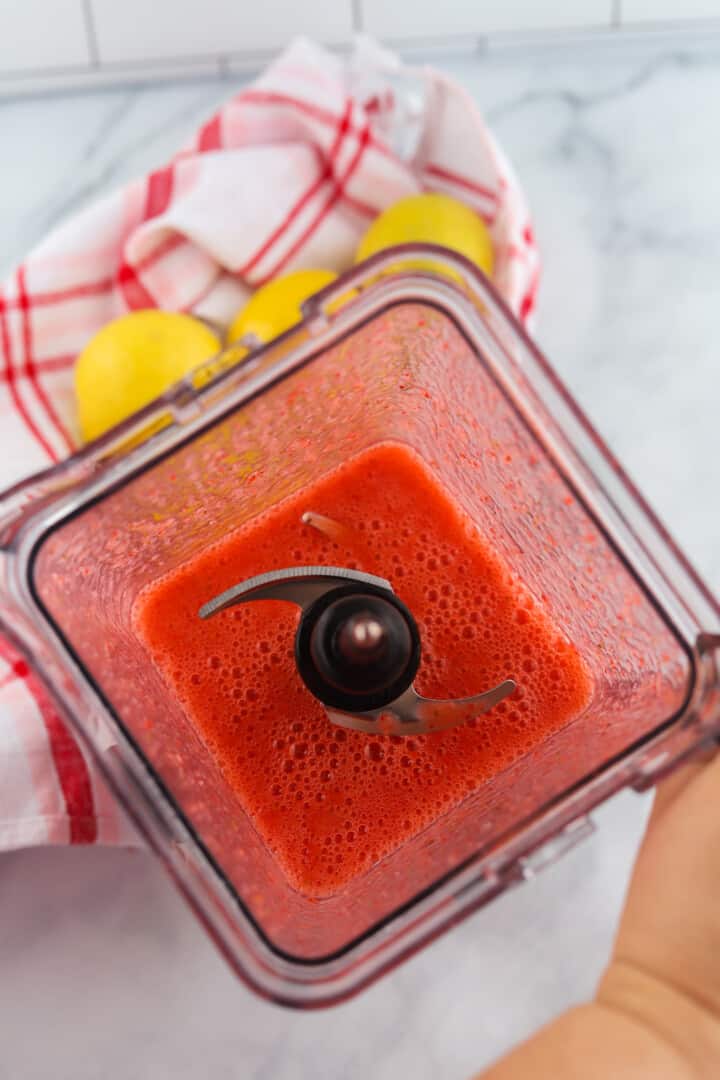 strawberries blended in blender to make the syrup.