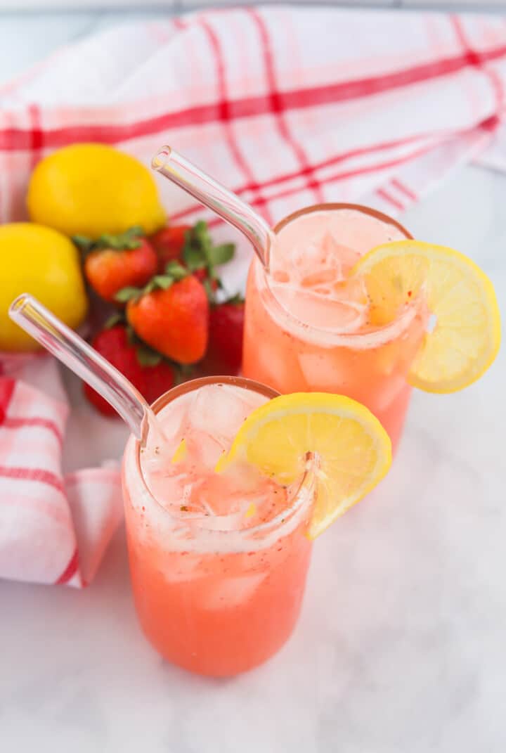 two glasses of strawberry lemonade top view.