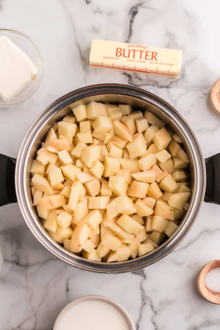 diced potatoes in a large pot ready to boil.
