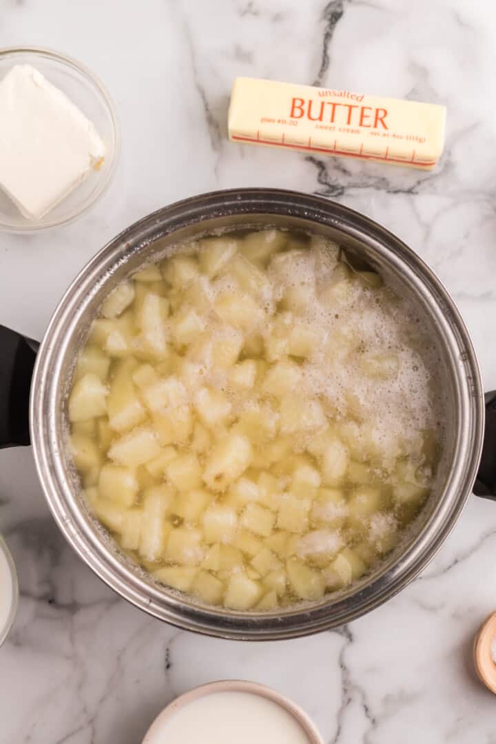diced potatoes boiled in large pot.