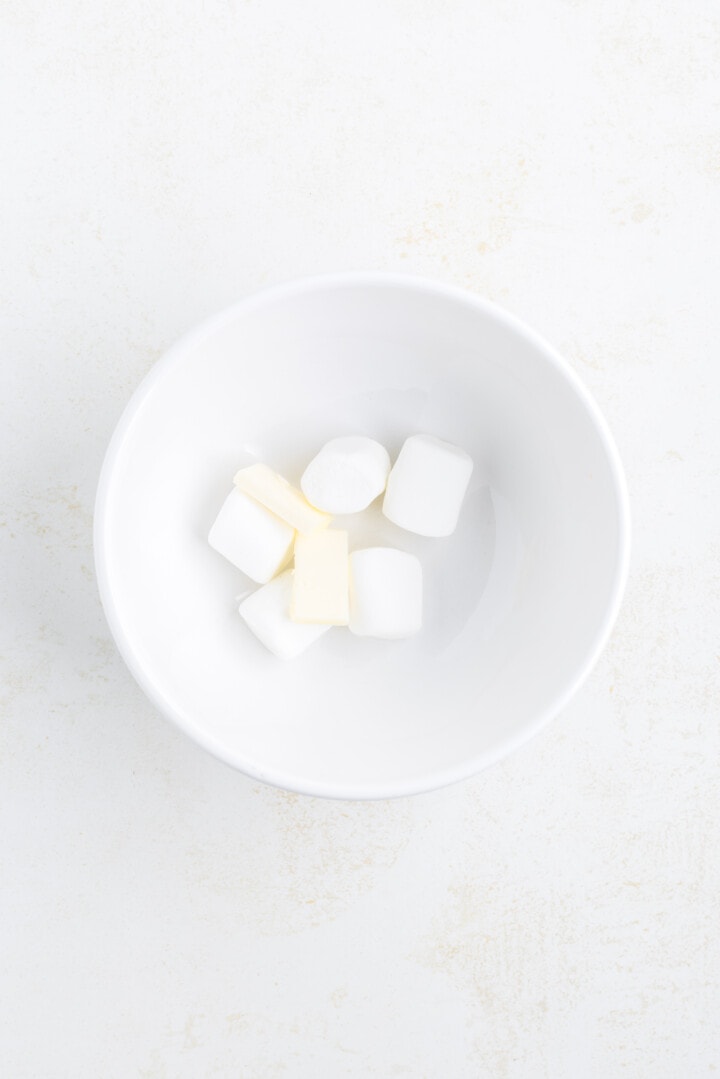 melting the marshmallows and butter together.